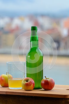 Traditional natural Asturian cider made fromÂ fermented apples in wooden barrels should be poured from great height for air